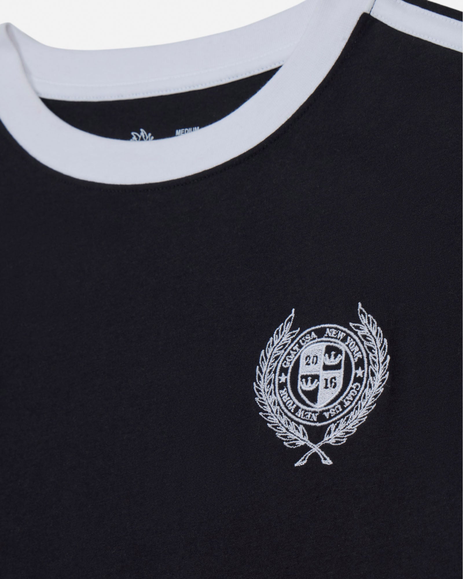 Black t-shirt with a white emblem#color_black