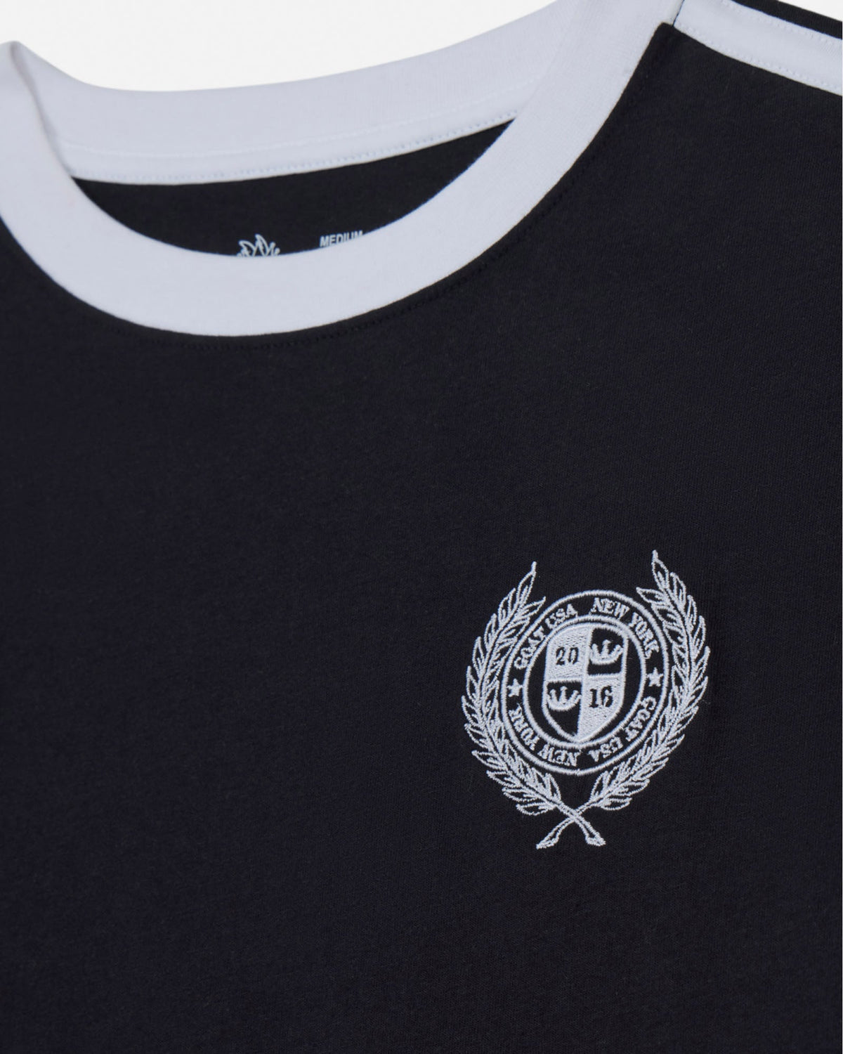 Black t-shirt with a white emblem