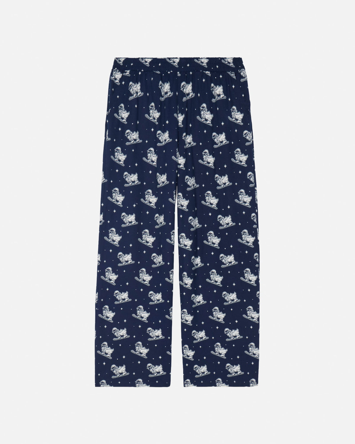 A pair of navy blue pajama pants with an all-over white cartoon skiier pattern, displayed flat against a light gray background.