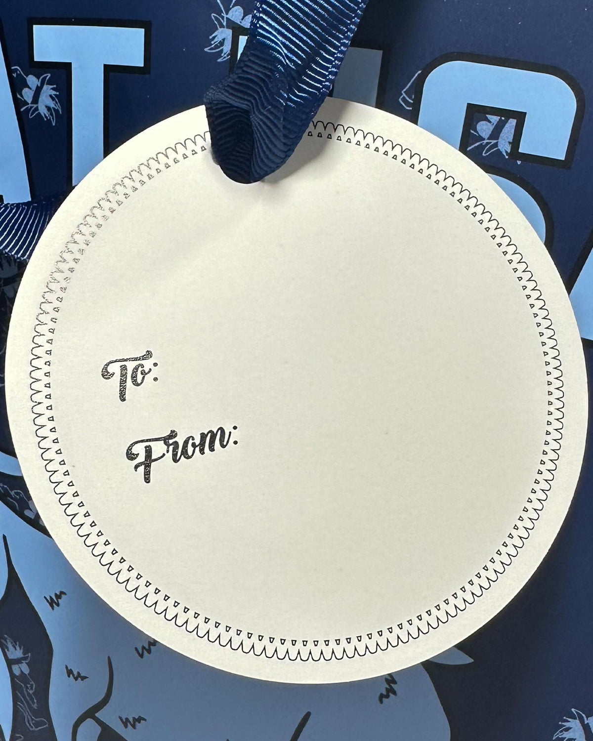 Close up of to/from tag on GOAT USA Gift Bag