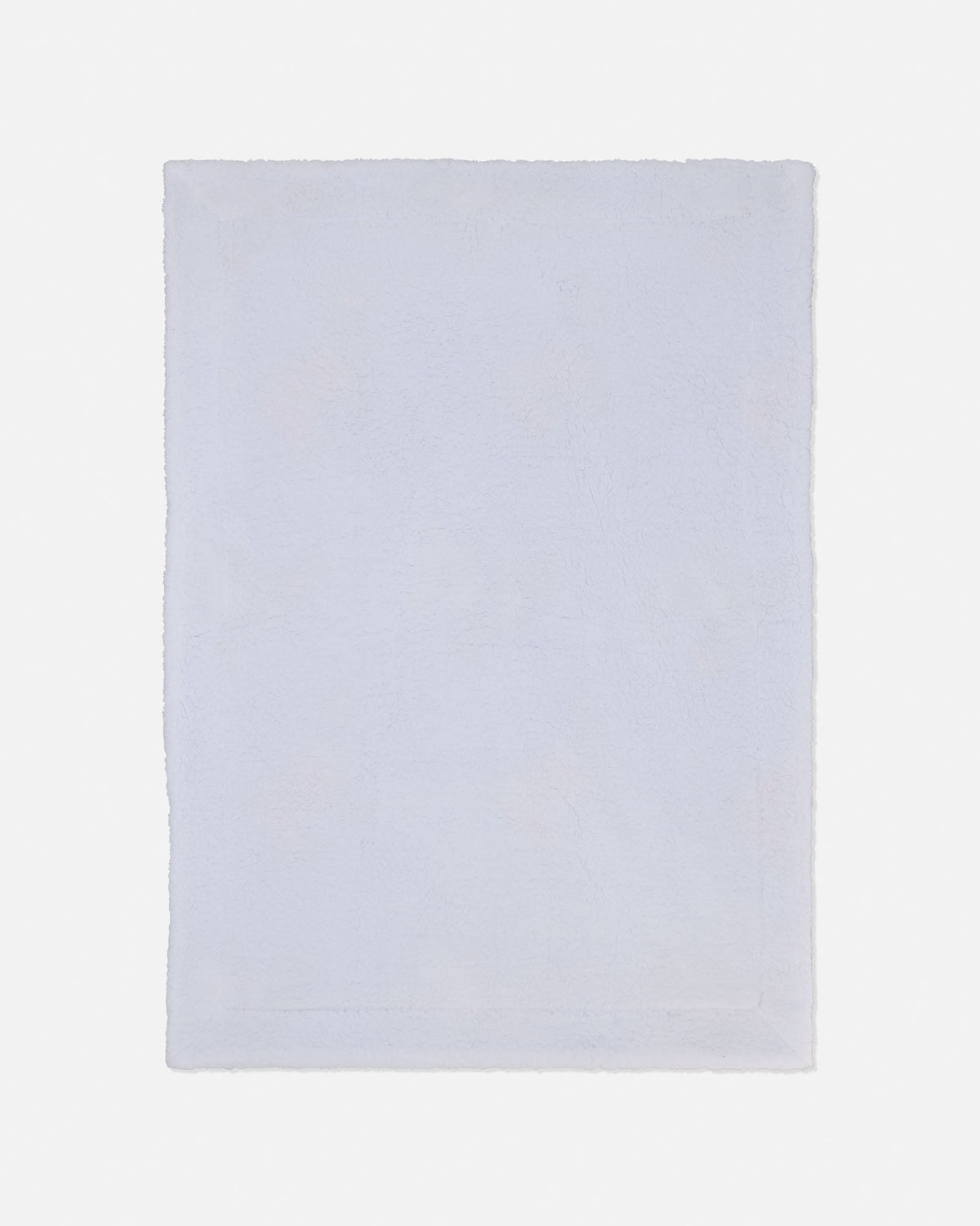 A light gray rectangular fabric item, possibly a towel or blanket, shown flat against a very light gray background.