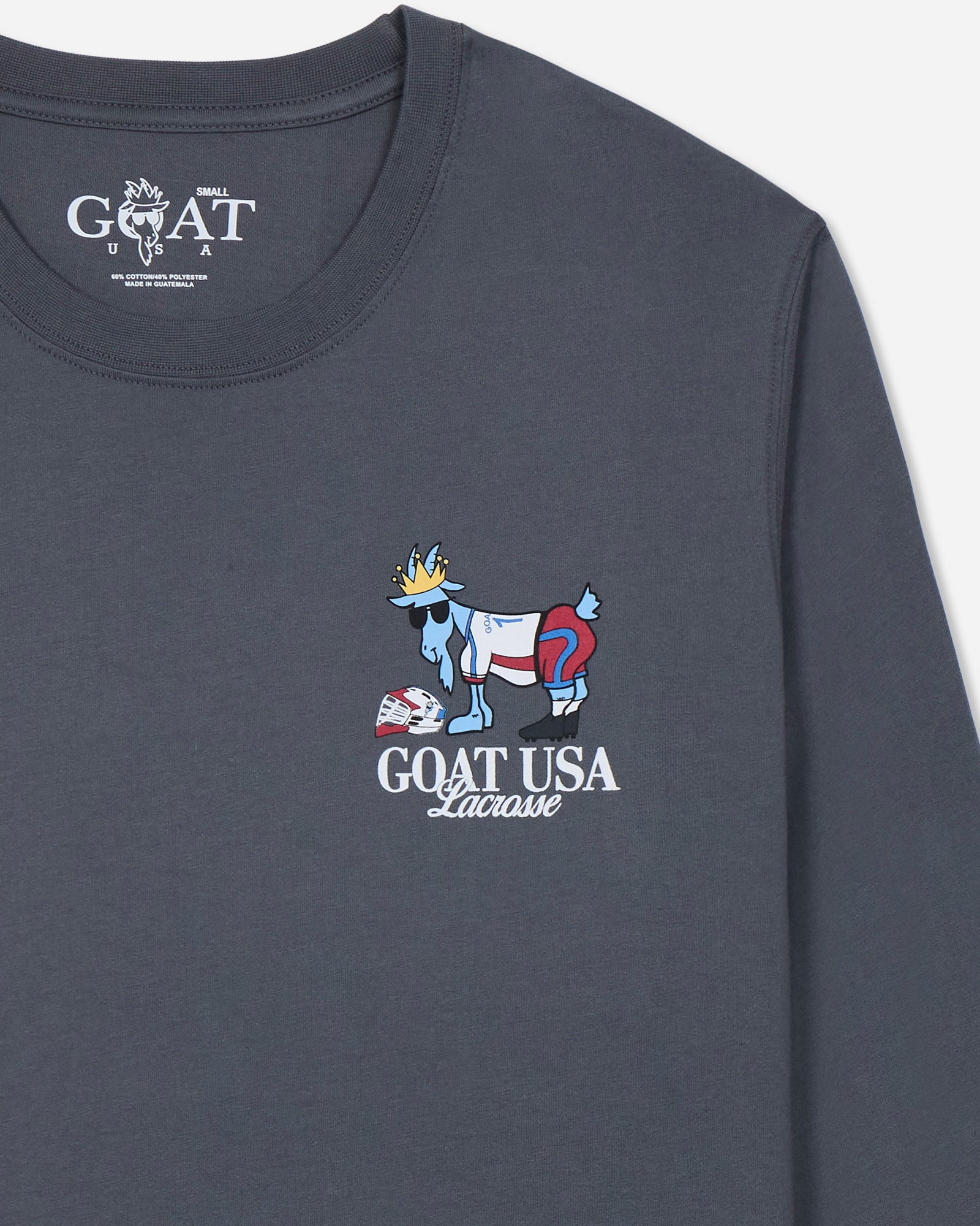 Gray long-sleeve shirt with 'GOAT USA Lacrosse' logo on a light gray background