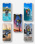 Set of five phone cases with beach-themed designs on a light gray background