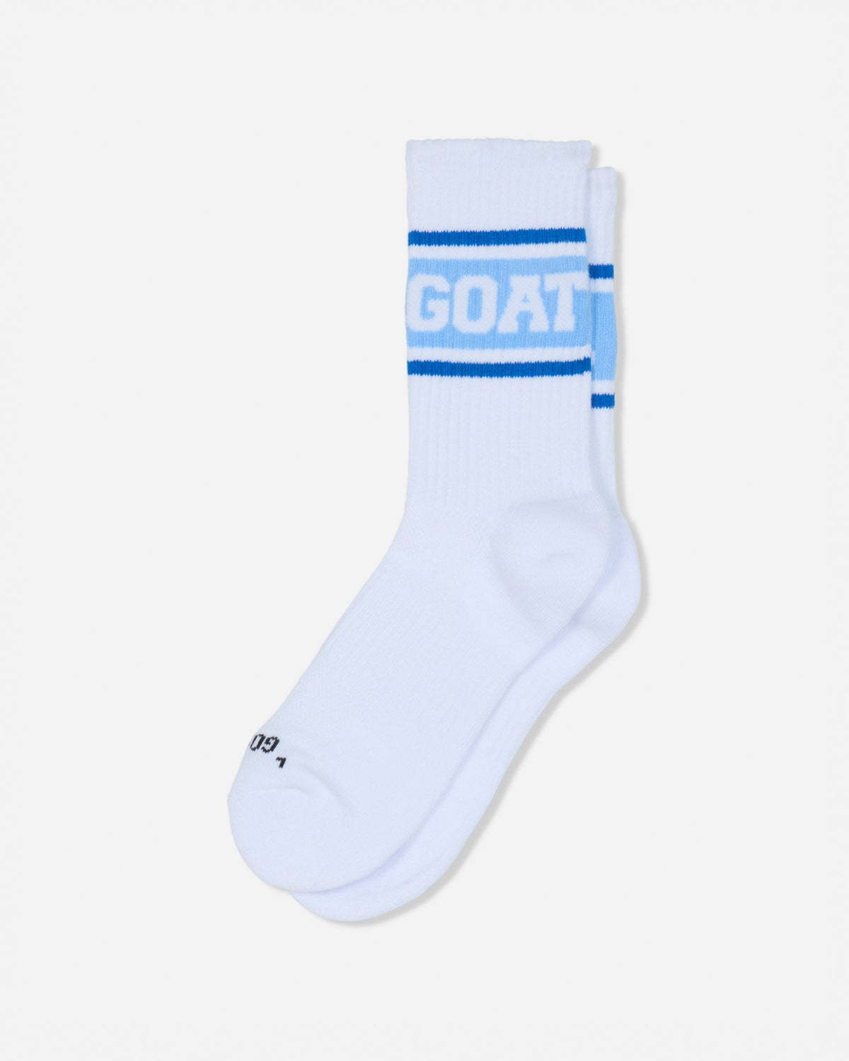 A pair of white crew socks with blue stripes and the word 'GOAT' printed in white on the front cuff, shown against a light gray background.