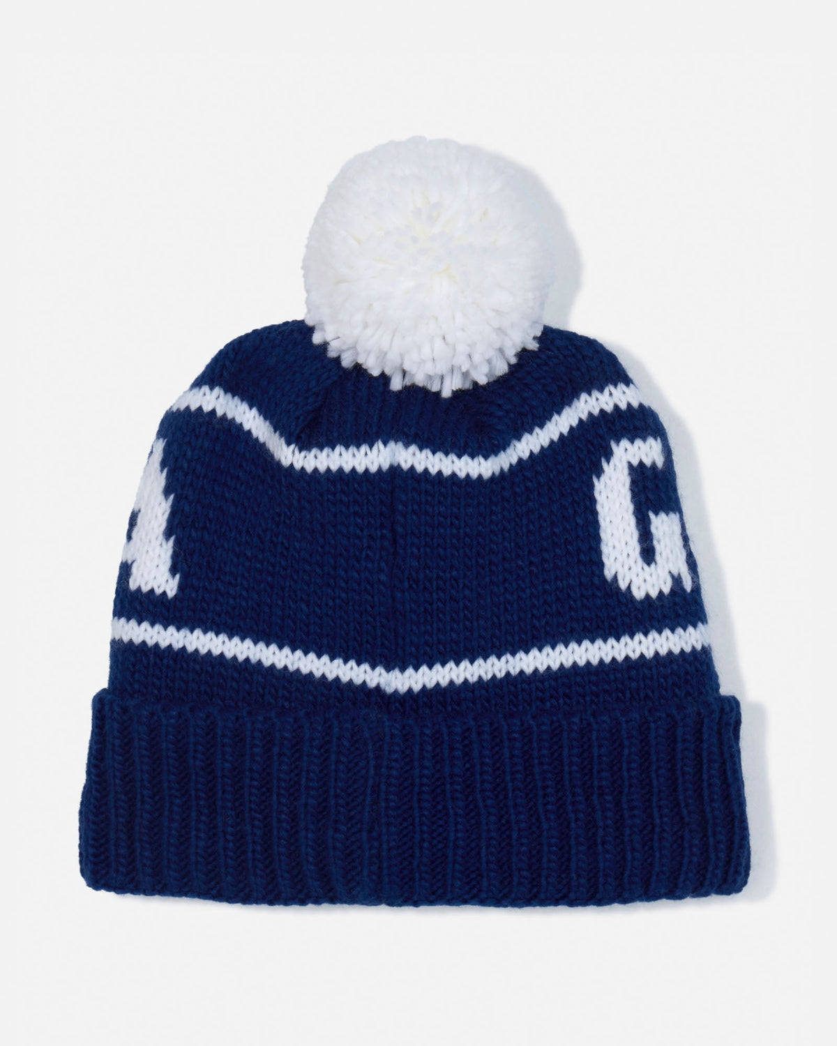 A navy blue knit pom-pom beanie hat with white stripes and a white fuzzy pom-pom on top, shown against a plain white background.