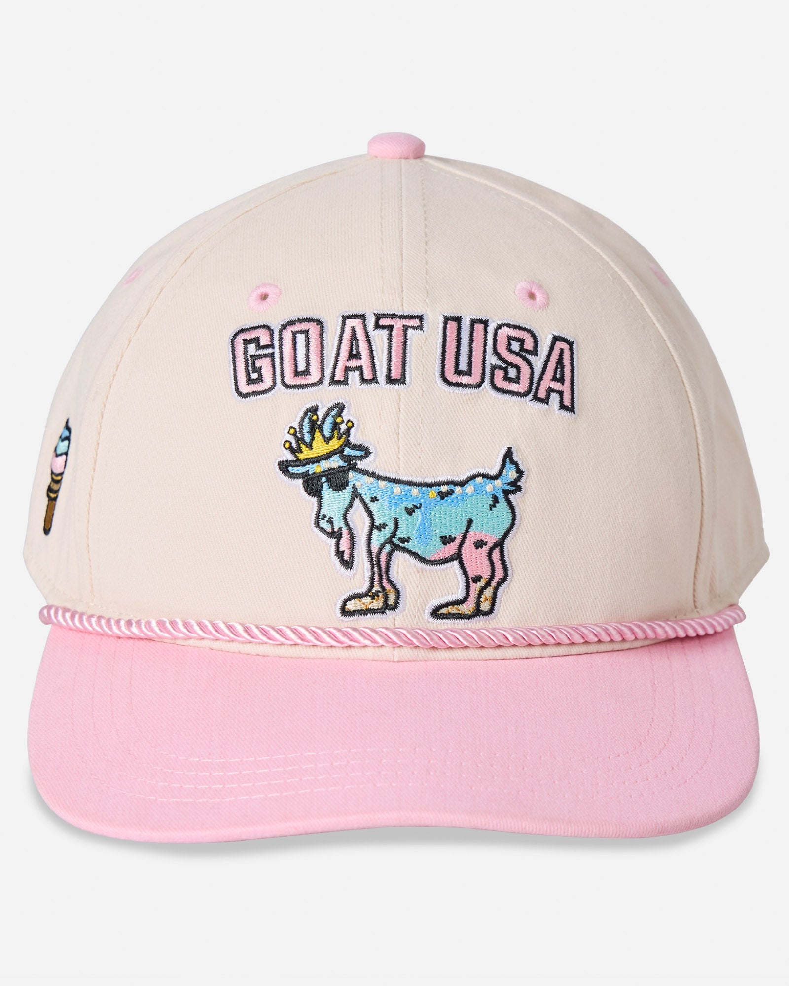 Head-on shot of stone and pink ice cream goat hat
