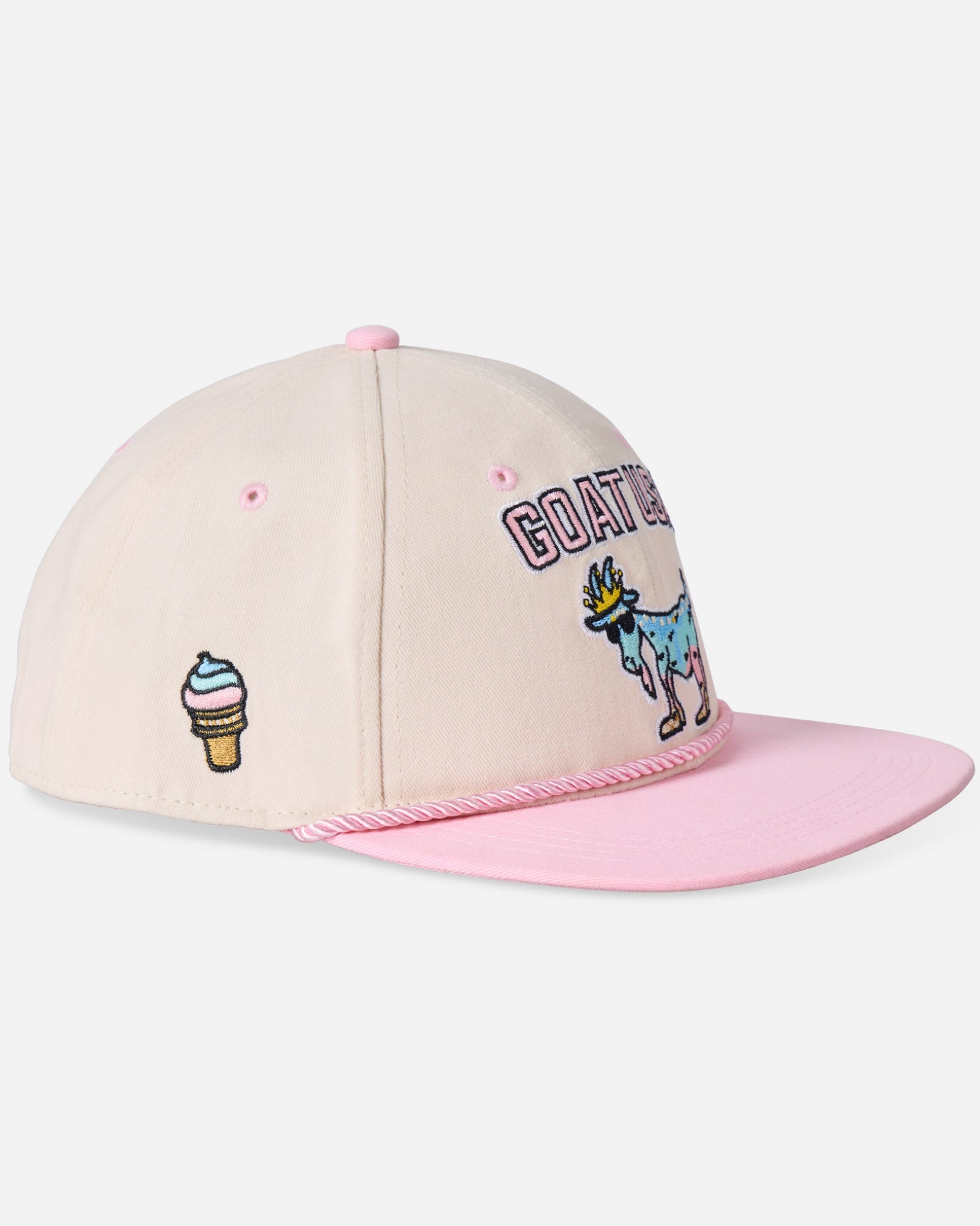 Angled view of stone ice cream goat hat with soft serve ice cream cone patch on the side