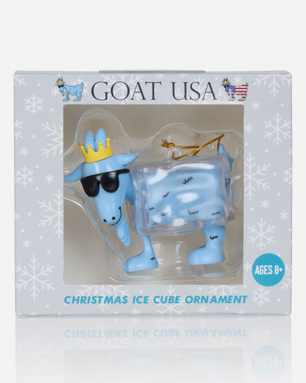 Goat USA Christmas Ice Cube Ornament in its retail packaging, featuring a light blue goat character wearing sunglasses and a gold crown next to a clear ice cube ornament.