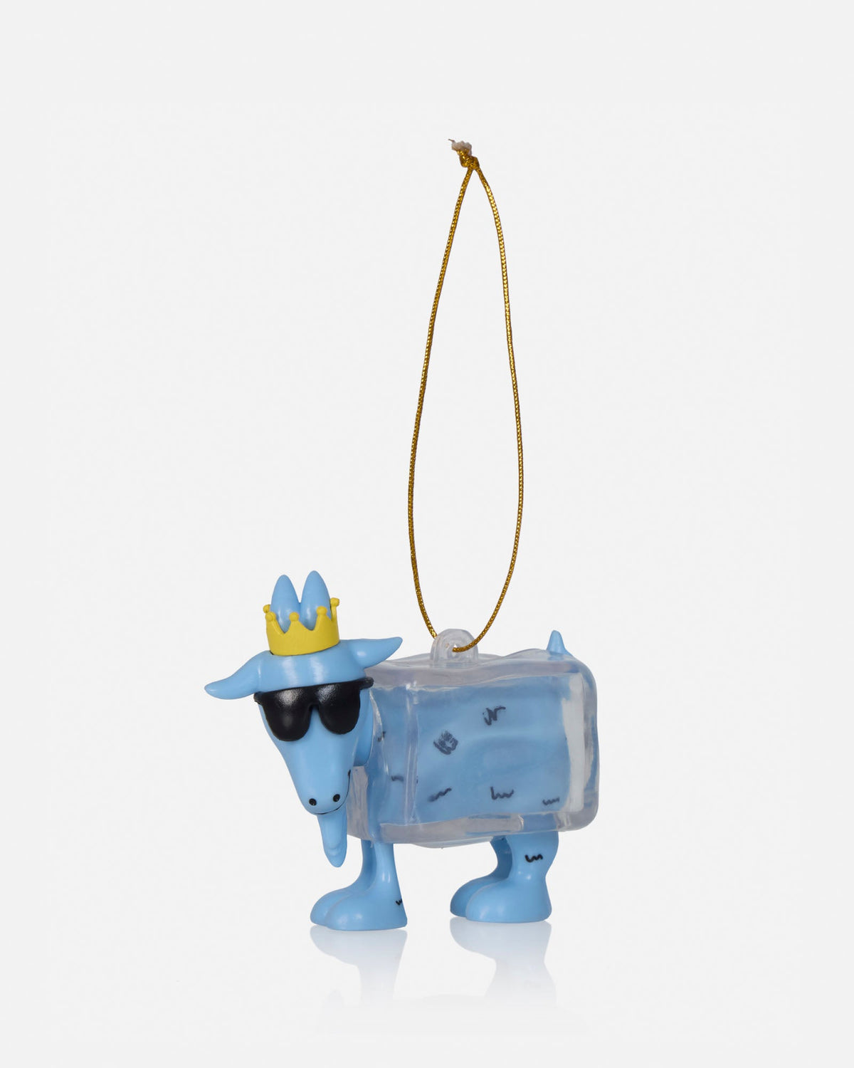 A light blue goat figurine wearing a yellow crown and black sunglasses, carrying a translucent blue ice cube on its back, with a gold hanging string, set against a plain light gray background.