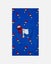 Beach towel with a goat that has a popsicle pattern on a light gray background