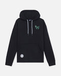 A black pullover hoodie with white drawstrings, featuring a small green embroidered goat logo on the left chest and a circular white patch on the lower left front pocket, shown against a light gray background.