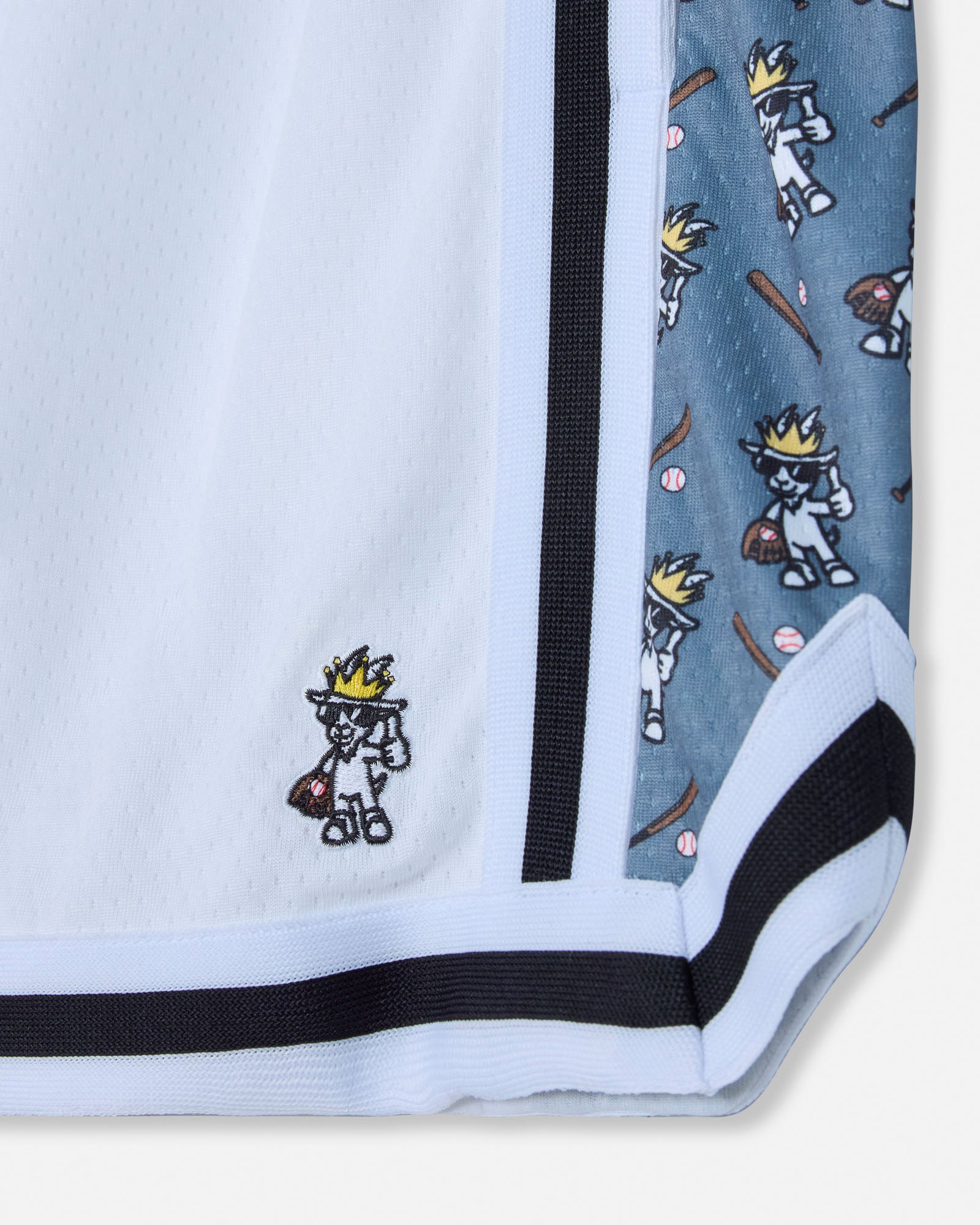 Close-up of baseball goat logo on white mesh shorts