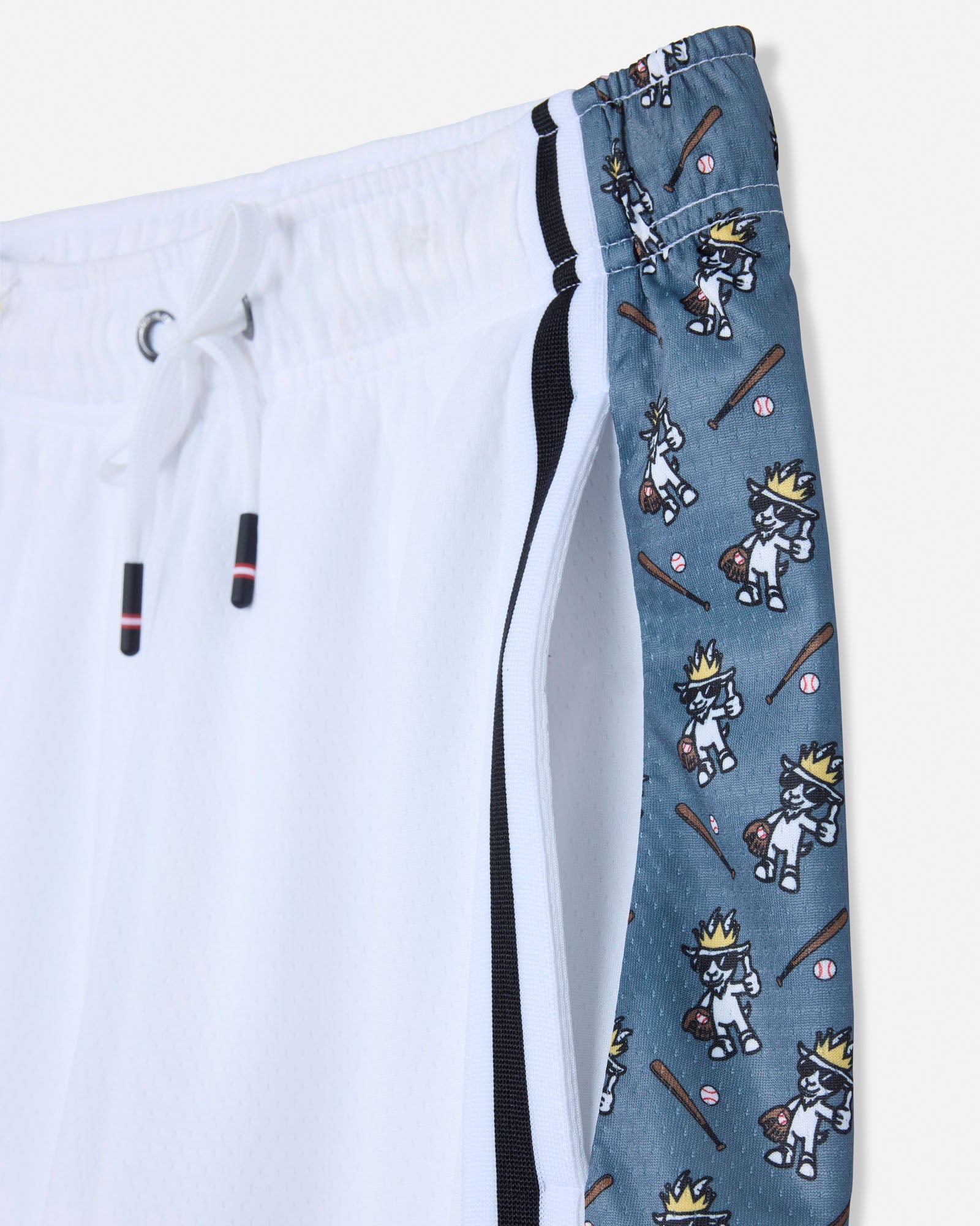 Close-up of pocket on white mesh shorts