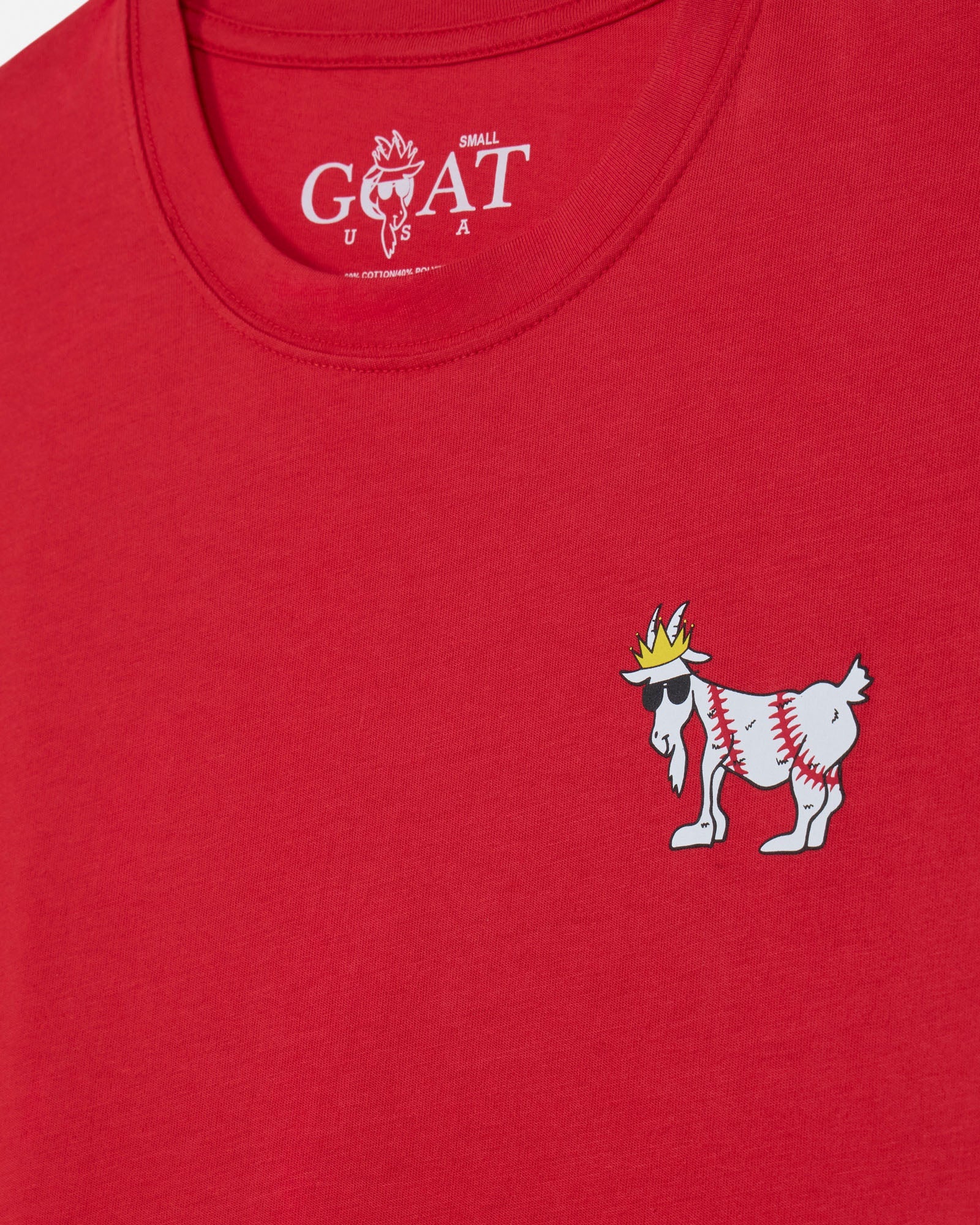 Red t-shirt with a small goat graphic and 'Small GOAT USA' text on a red background