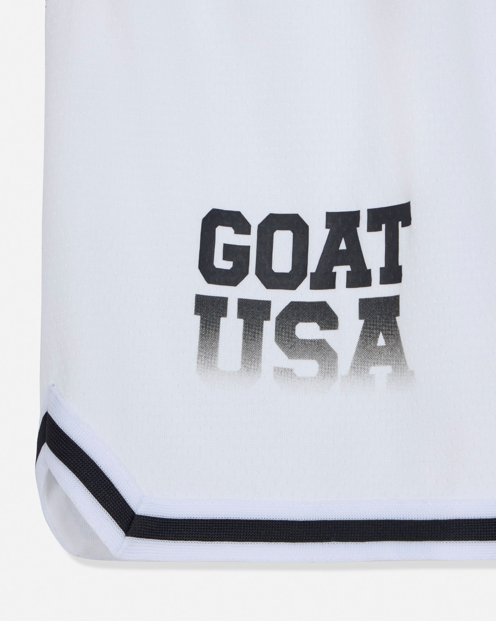 White shorts with 'GOAT USA' text on a white background#color_white