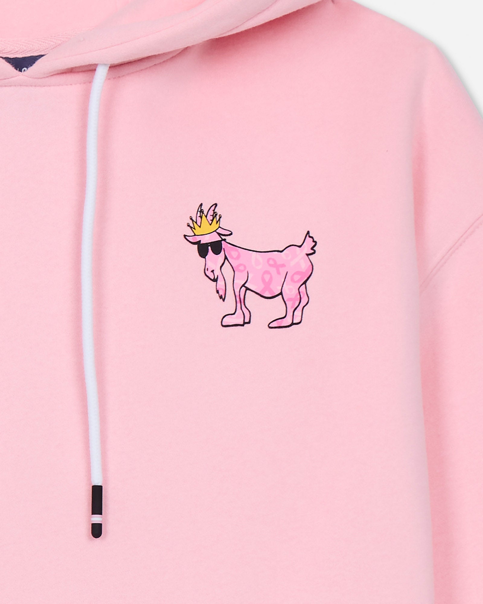 Pink hoodie with a cartoon goat wearing a crown and sunglasses