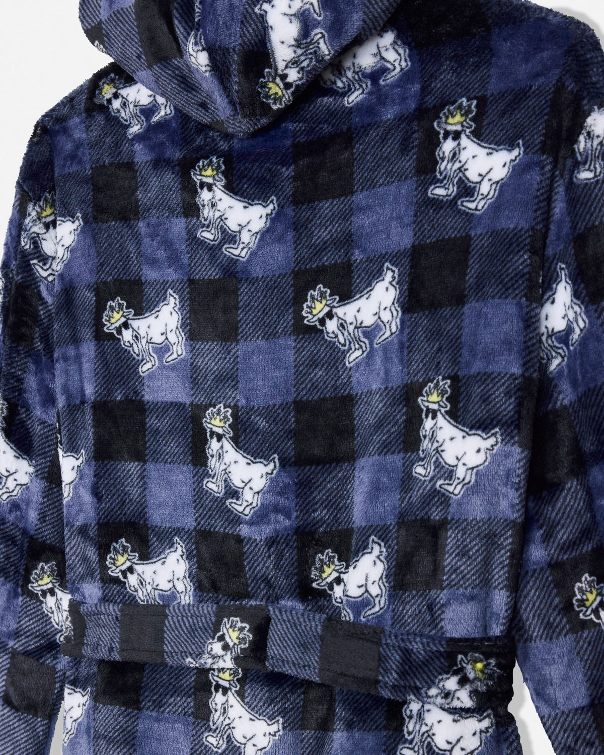A close-up of a hooded robe or jacket made from a plush flannel-like fabric, featuring a navy and black buffalo plaid pattern with repeated white goat motifs wearing small yellow hats.
