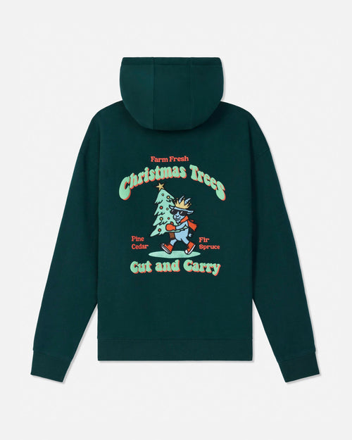 A dark green hooded sweatshirt shown from the back, featuring a colorful graphic of a cartoon Christmas tree and the text 'Farm Fresh Christmas Trees Cut and Carry'.