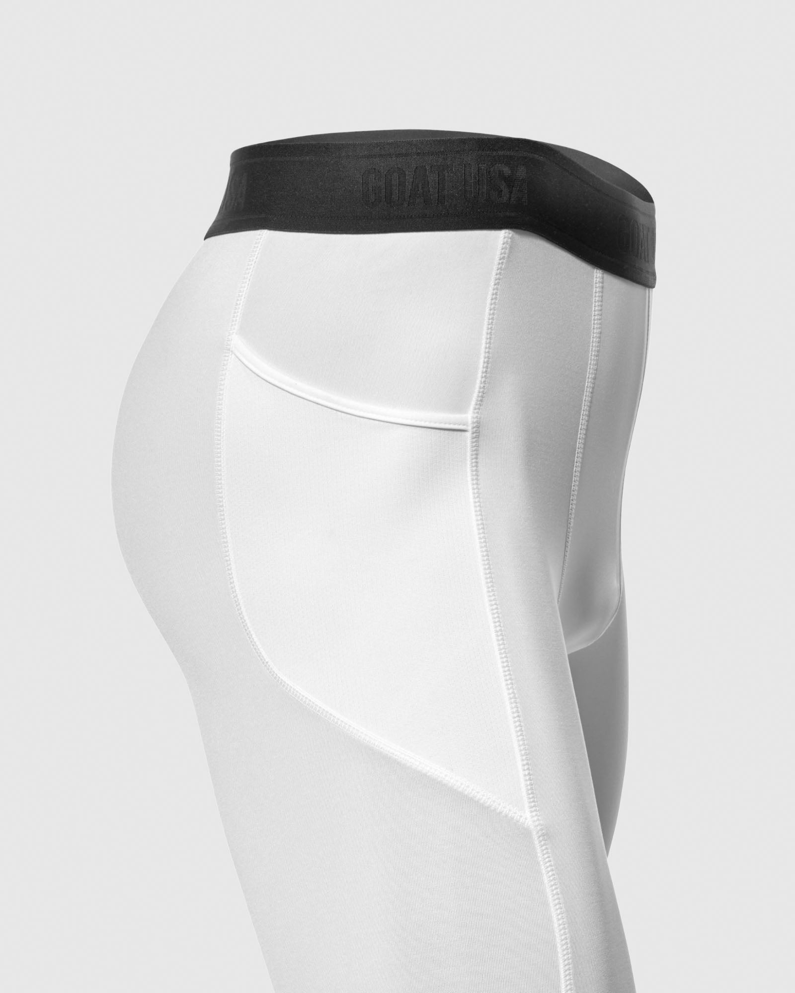 Side of white compression leggings#color_white