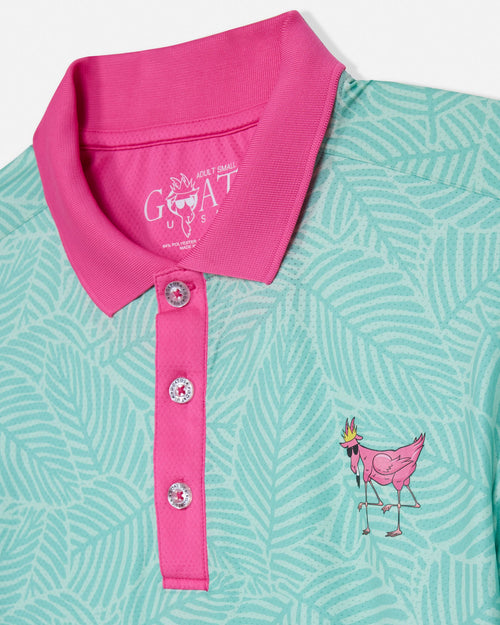 Mint green polo shirt with pink collar and goat graphic on a white background