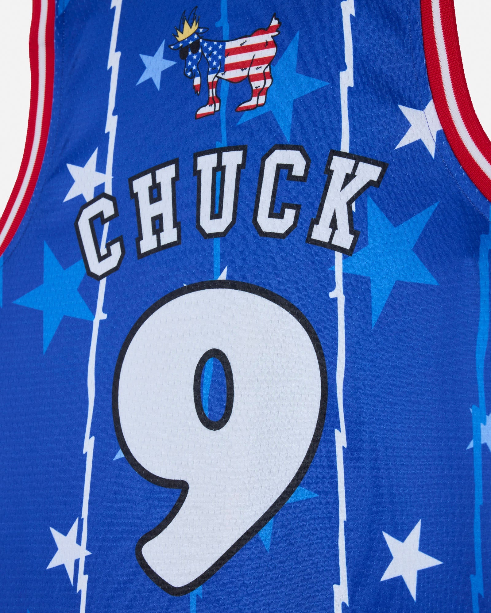 Blue sports jersey with 'CHUCK' and number '9', featuring a patriotic design.