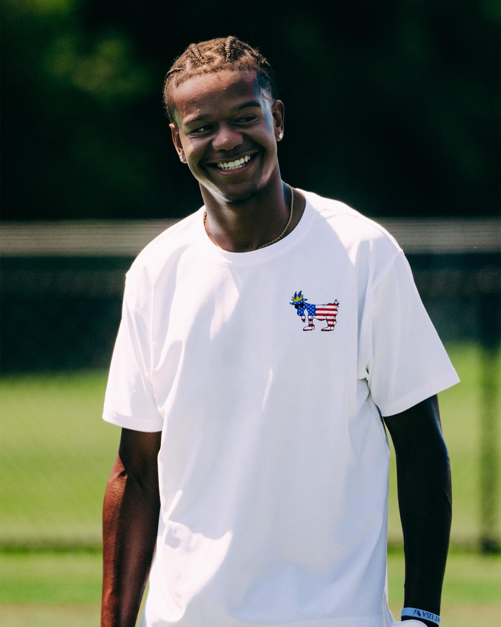 Male model wearing white Freedom T-Shirt#color_white