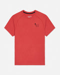 Red t-shirt with a small black logo on a light gray background