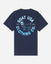 A navy blue short-sleeve t-shirt shown from the back, featuring a large light blue graphic print with a goat illustration and the text 'GOAT USA CLOTHING CO.' and 'EST.#color_navy-blazer