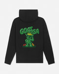 A black pullover hoodie shown from the back, featuring a large green graphic of a cartoon character wearing a gold crown and the word 'GOAT USA' in bold green letters above it.