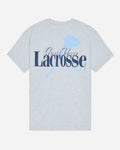 A light heather gray short-sleeve t-shirt with a graphic on the front reading 'Goat USA Lacrosse Club' in navy and light blue, featuring a lacrosse stick design.