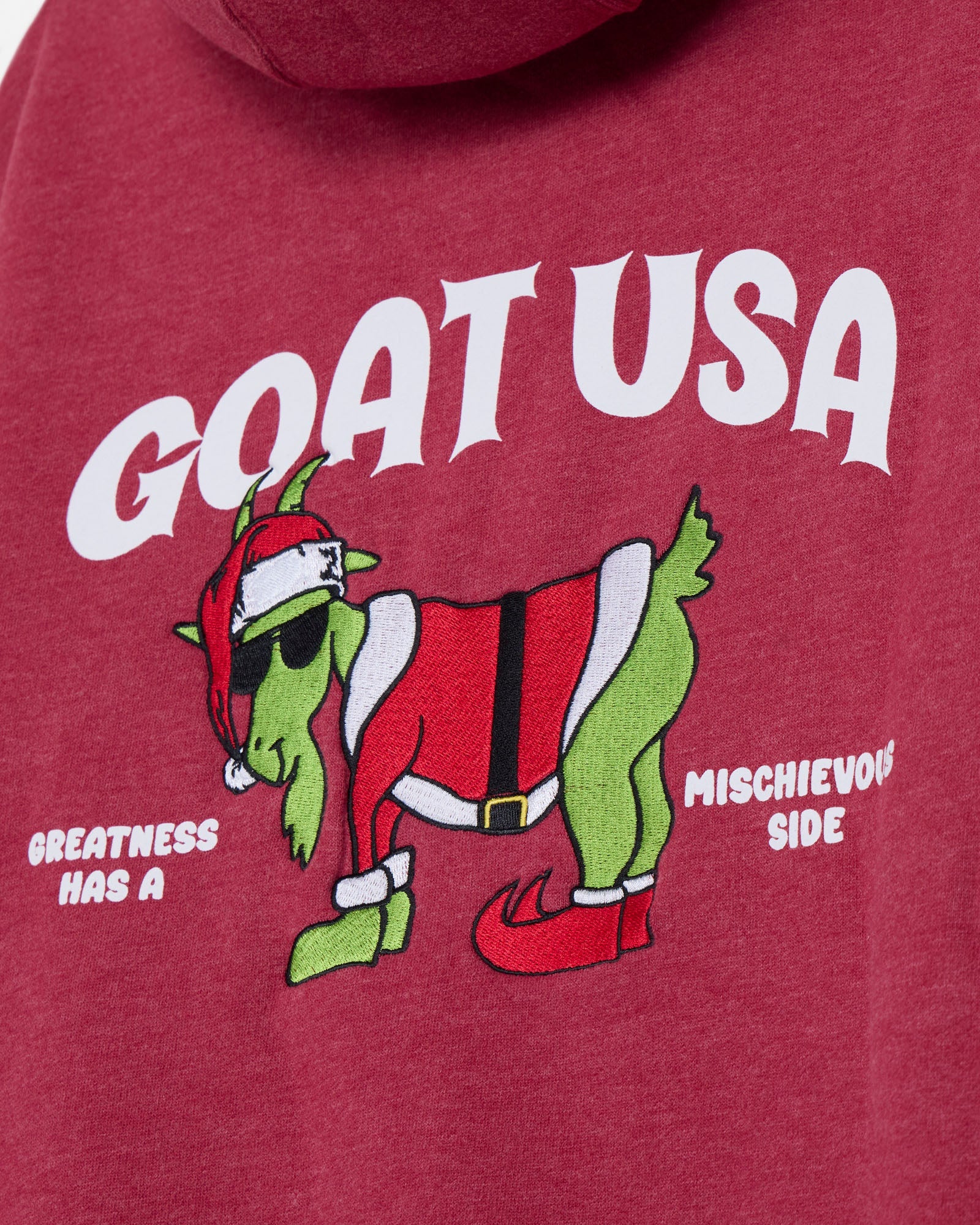 Red hoodie with 'GOAT USA' and cartoon goat design on a red background