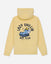 A pale yellow hooded sweatshirt shown from the back, featuring a large graphic print of a sleeping cartoon character on a bed with the text 'LAZY CHILLIN' and 'NAP CLUB' in black.