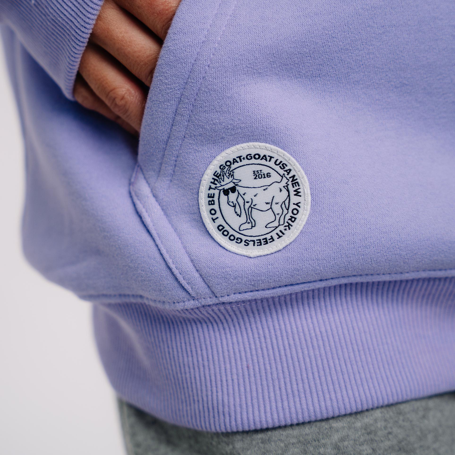 Close-up of patch on lavender WG Hooded Sweatshirt#color_lavender