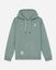 A sage green pullover hoodie with white drawstrings, featuring a small white goat graphic on the left chest and a circular patch on the lower left front pocket, displayed against a light gray background.#color_steeped-sage