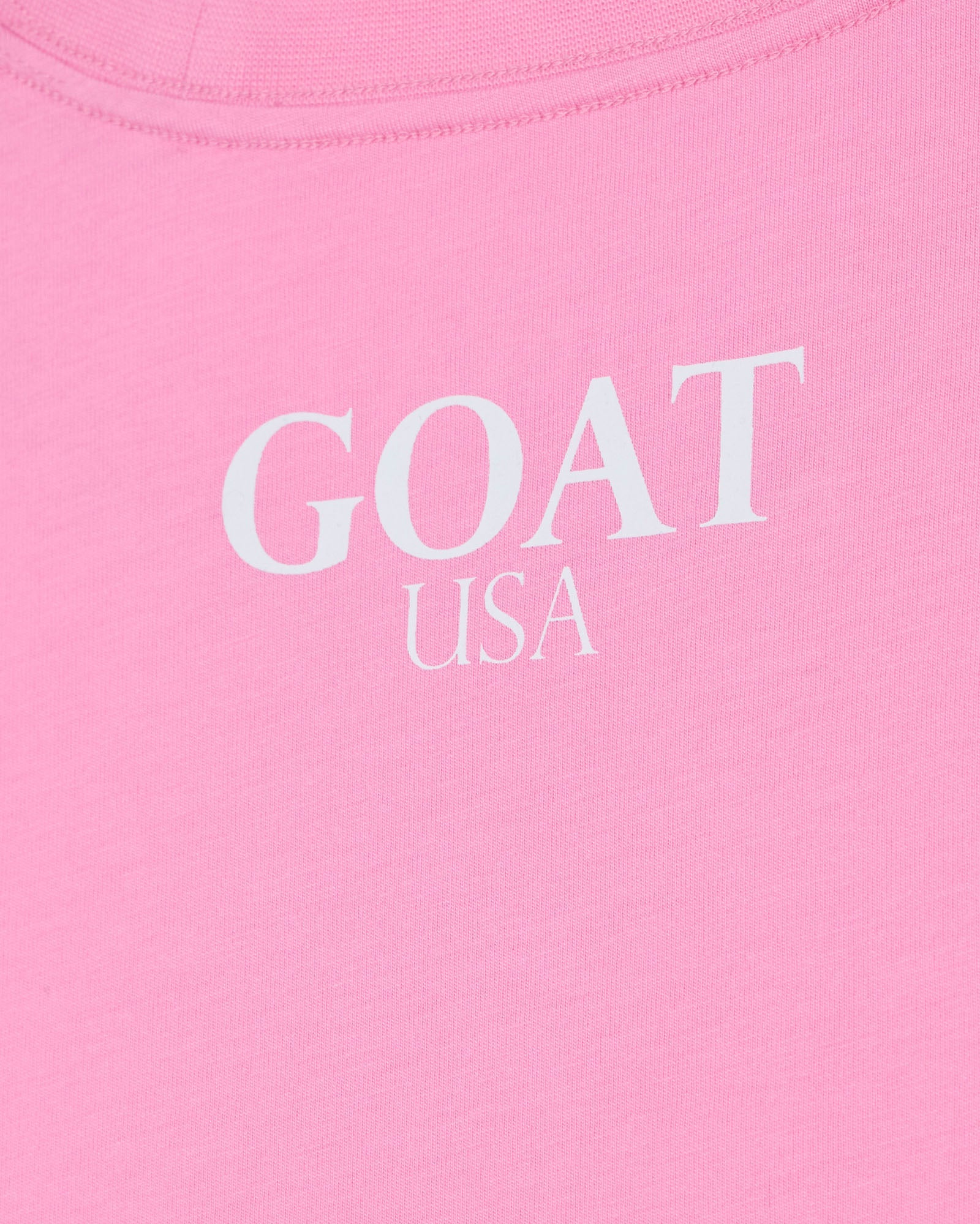 Pink t-shirt with 'GOAT USA' text in white#color_paradise-pink
