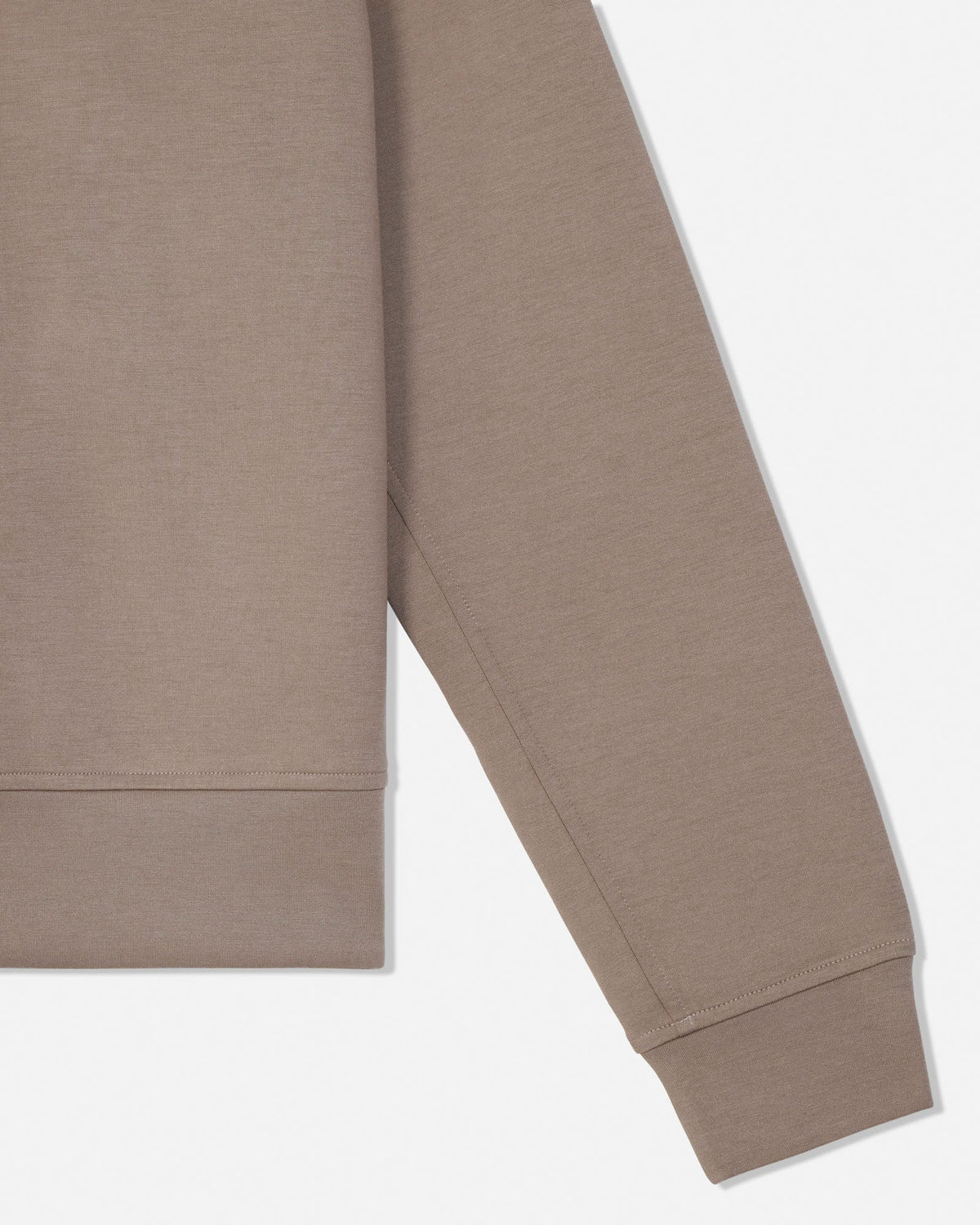 Sleeve of brown hoodie made with athletic material