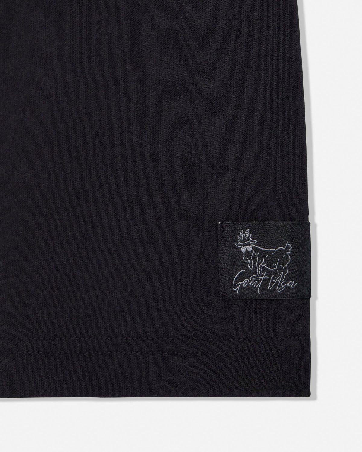 Black t-shirt with a small stitched tag