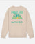 Beige sweatshirt with pickleball graphic and text on a light gray background
