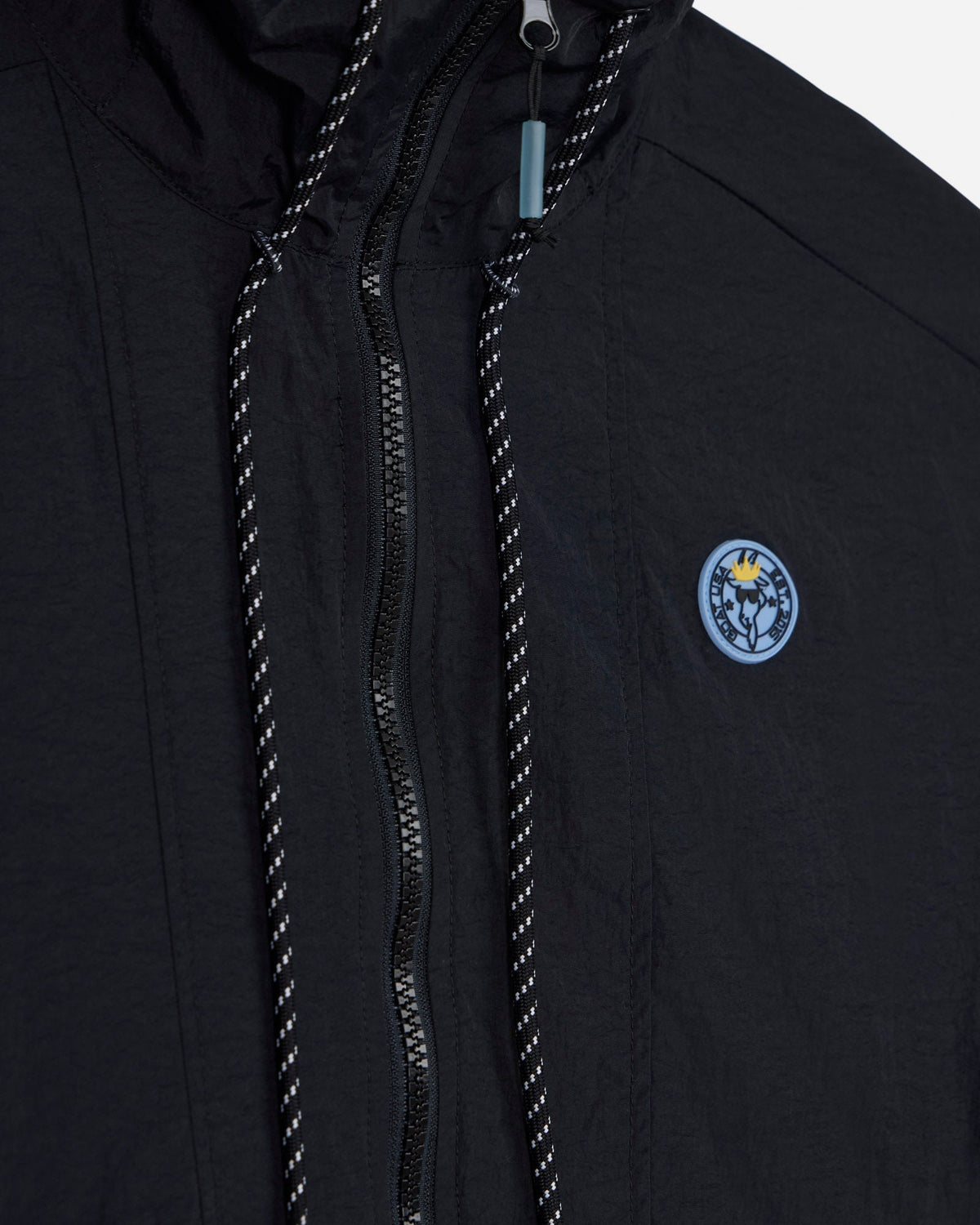 Close-up of black windbreaker