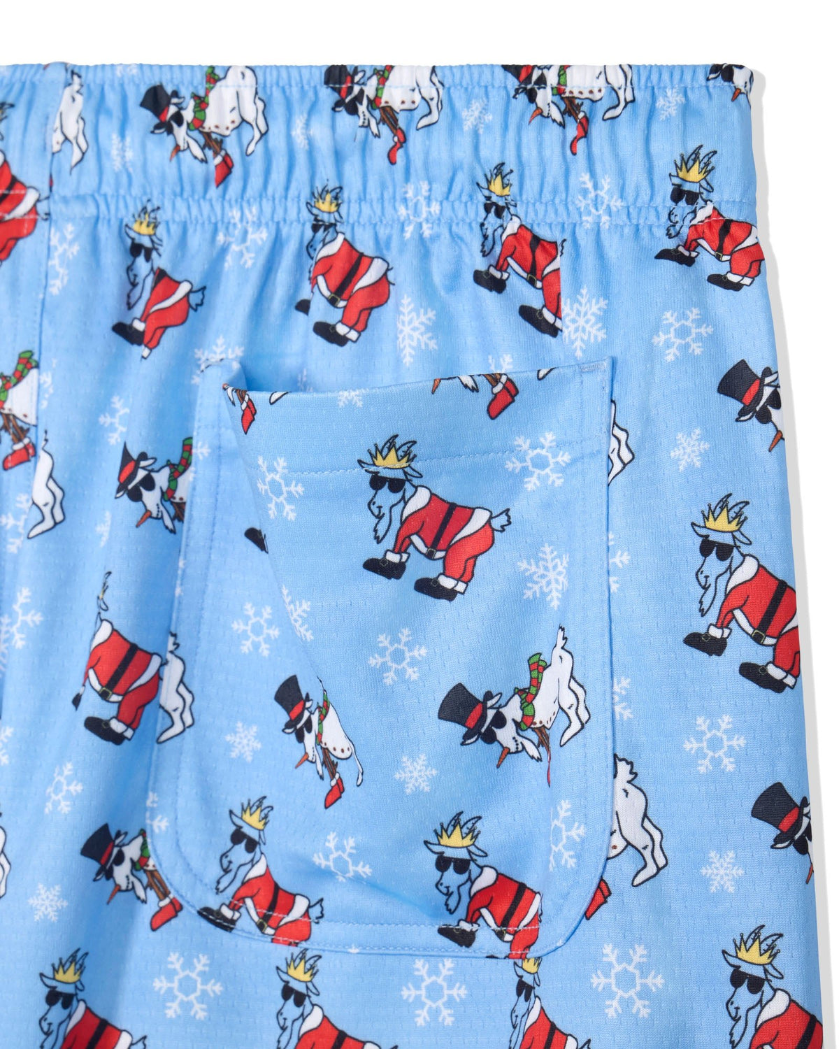 Light blue elastic waistband shorts featuring an all-over print of walking snowman and santa figures and snowflakes.