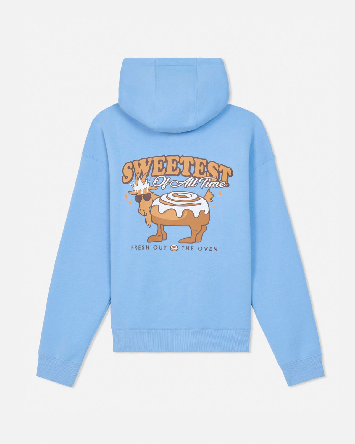 A light blue pullover hoodie shown from the back, featuring a large graphic print of a cinnamon roll with the text 'SWEETEST OF ALL TIME' and 'FRESH OUT OF THE OVEN'.