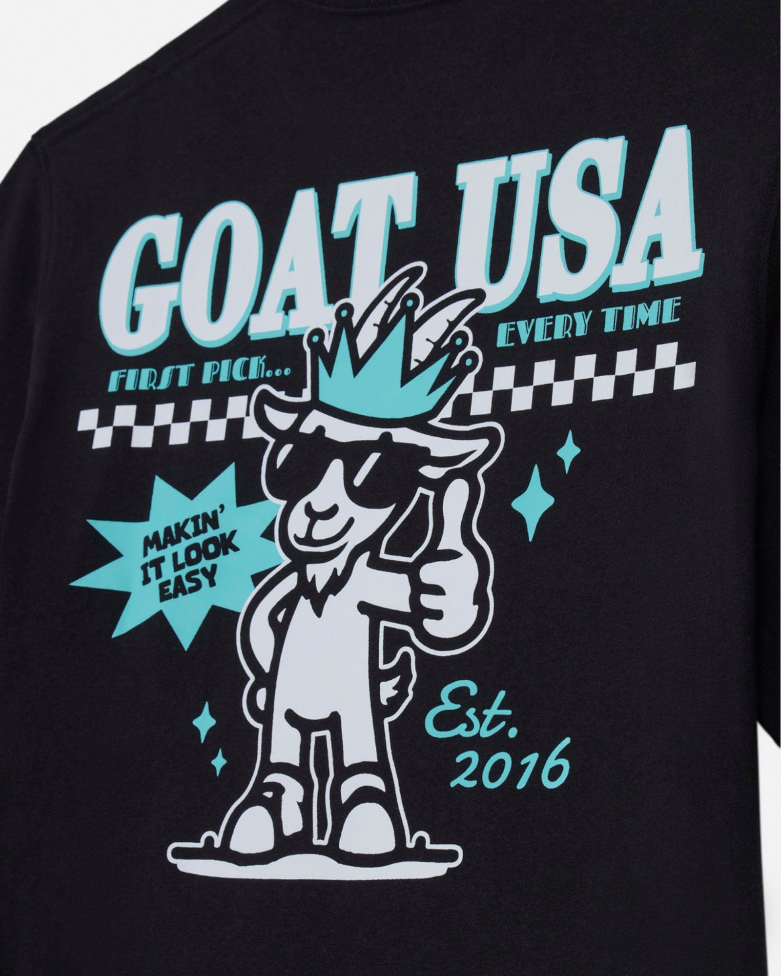 Black t-shirt with 'GOAT USA' graphic design featuring a cartoon goat with a crown and text.