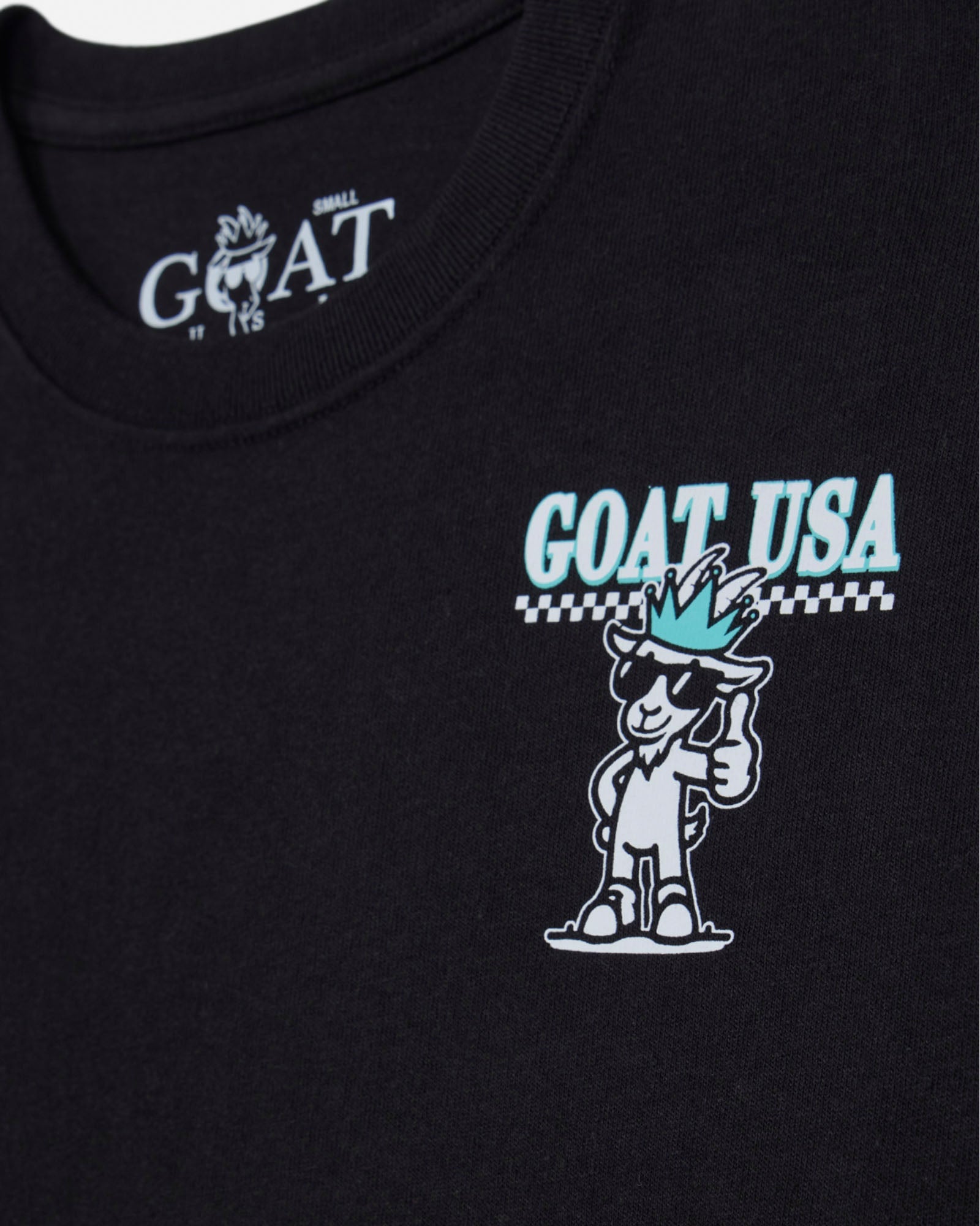 Black t-shirt with 'GOAT USA' logo featuring a cartoon goat character on a black background.