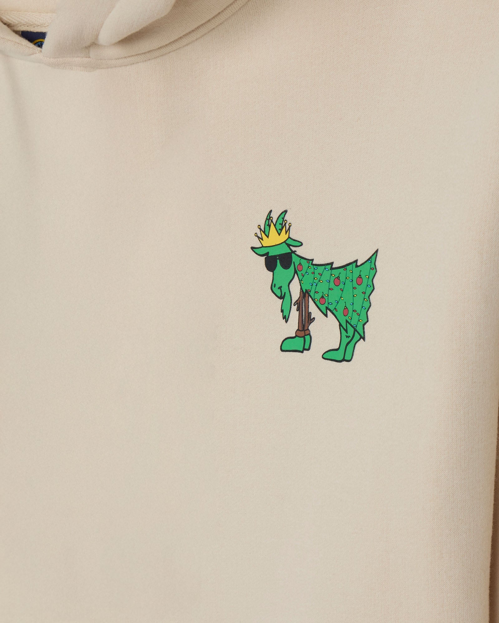 Beige hoodie with a green cartoon character wearing a crown on a beige background