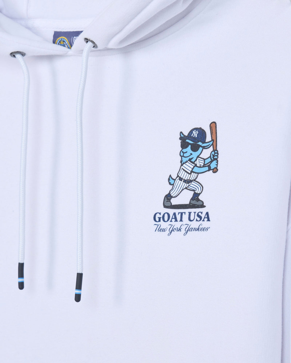Close-up of left chest design with blue baseball player goat mascot in a New York Yankees uniform