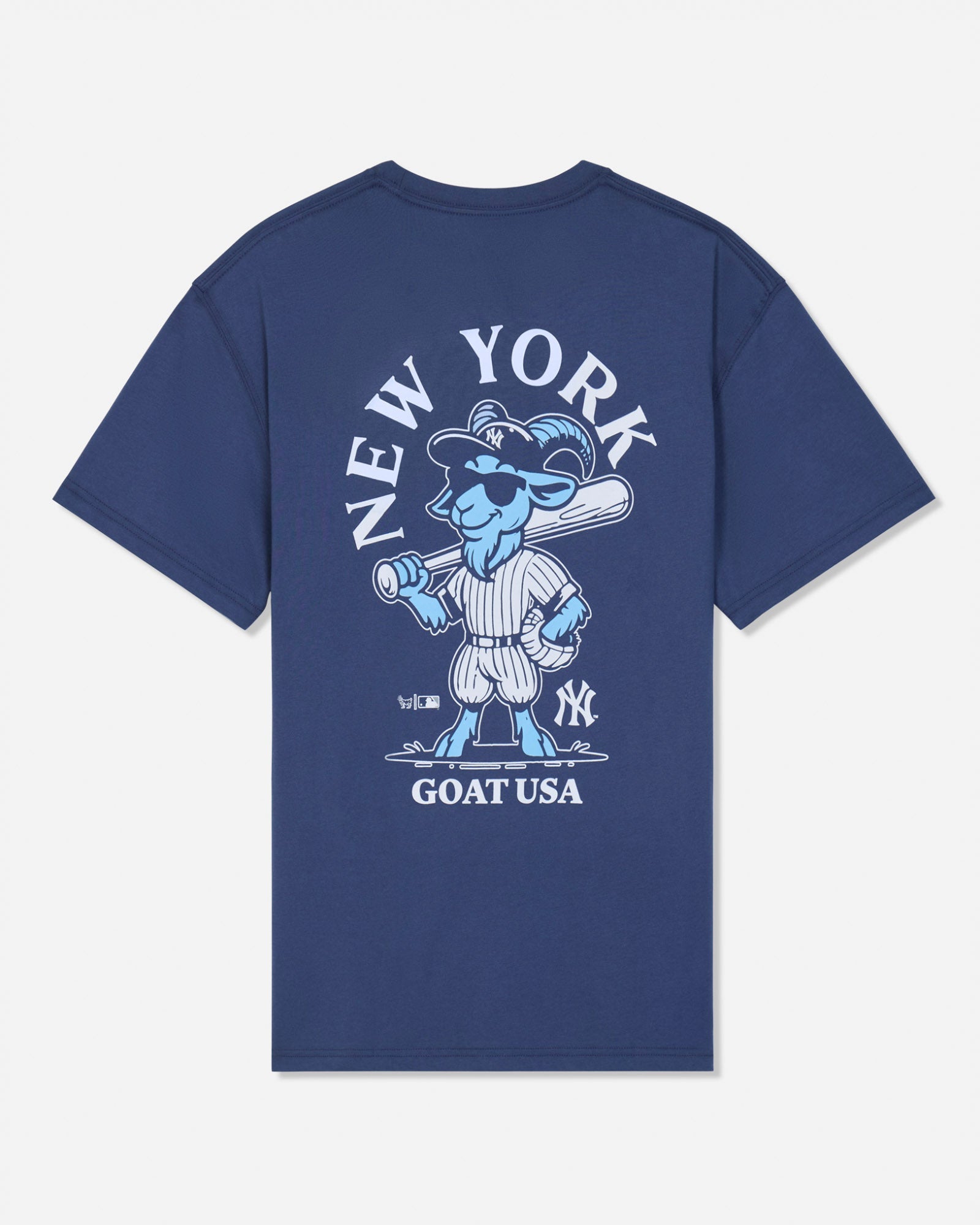 A navy blue short-sleeve t-shirt with a large graphic on the back featuring a light blue cartoon goat baseball player, the text 'NEW YORK' arched above, and 'GOAT USA' below.
