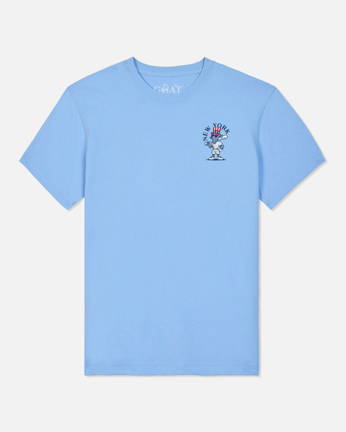 A light blue short-sleeve crewneck t-shirt with a small graphic on the left chest and 'GOAT' printed inside the collar, shown against a light gray background.