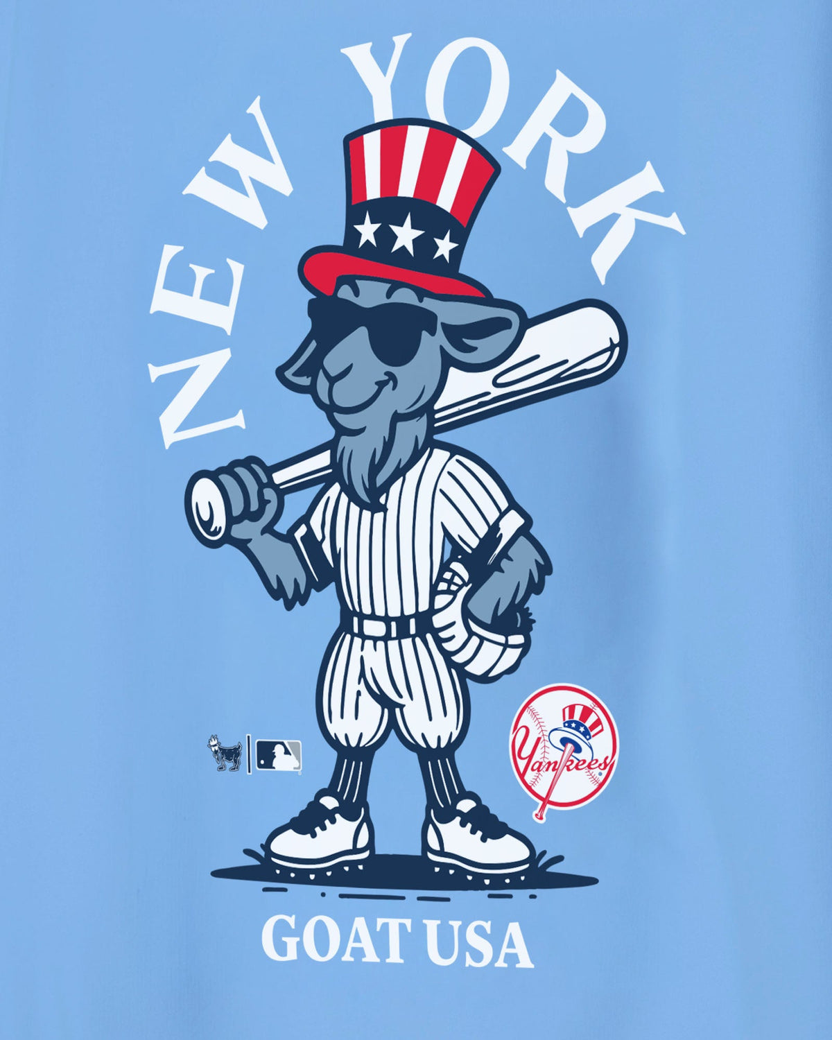 A light blue graphic print featuring a cartoon goat dressed as a baseball player with a patriotic Uncle Sam hat, with the text 'NEW YORK' above and 'GOAT USA' below.