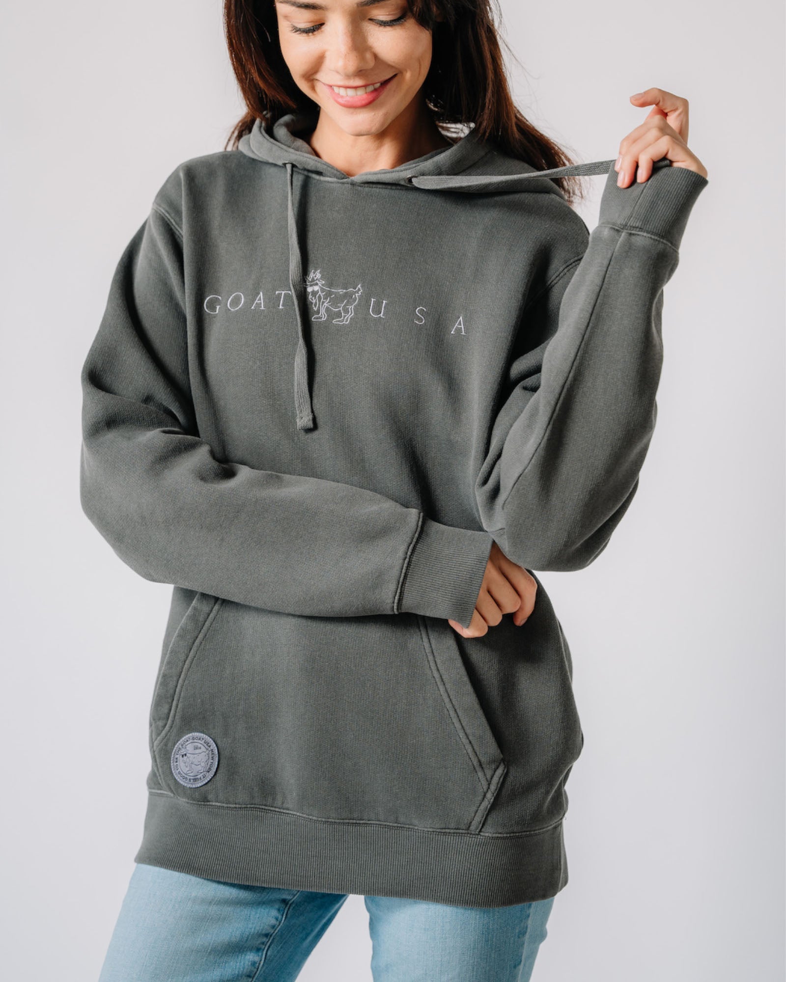 Model wearing pepper Linden Hooded Sweatshirt#color_pepper
