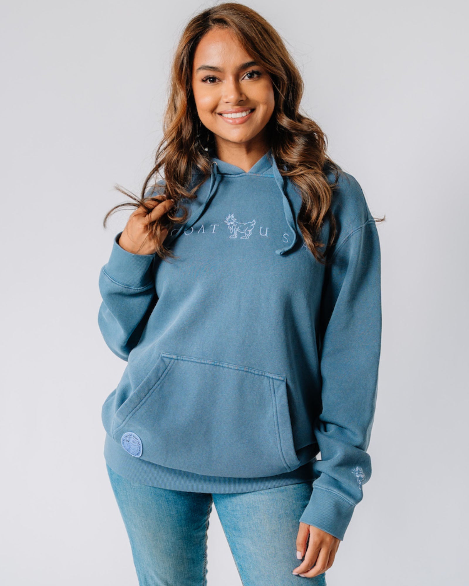 Model wearing slate Linden Hooded Sweatshirt#color_slate